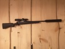Remington 700 AWR (alaska wether rifle)  Nikko Stirling 1-4*24, sonic demper thumbnail